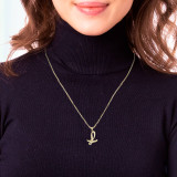 Yellow Gold Cursive initial “L” Pendant Necklace  on a Model
