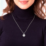 Silver Saint Michael Star Coin Pendant Necklace on a Model Silver Saint Michael Star Coin Pendant Necklace on a Model