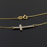 14K Yellow Gold Sideways Diamond Curved Cross Necklace (0.35")