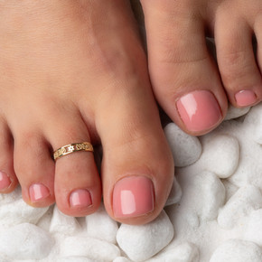 Gold Woman's Bohemian Chic Floral Toe Ring on female model