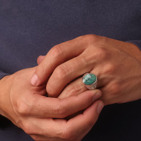 Silver Celtic Trinity Knot Turquoise Birthstone Ring on male model