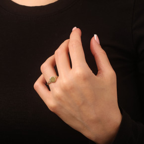 Gold Oval Signet Ring - Engravable Jewelry on female model Gold Oval Signet Ring - Engravable Jewelry on female model