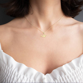 Yellow Gold Shark Symbol of Strength Pendant Necklace on a Model
