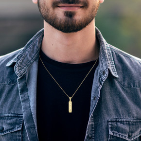 Solid Yellow Gold Egyptian Cartouche Necklace on Male model Solid Yellow Gold Egyptian Cartouche Necklace on Male model