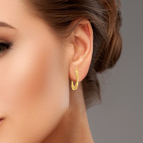 14K Yellow Gold Striped & Solid Octagon Reversible Hoop Earrings on female model