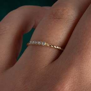14K Yellow Gold Pave Set CZ Roped Twist Band Ring on female model