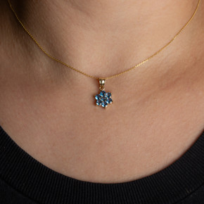14K Yellow Gold Flower Petal Aquamarine Gemstone Pendant Necklace on female model