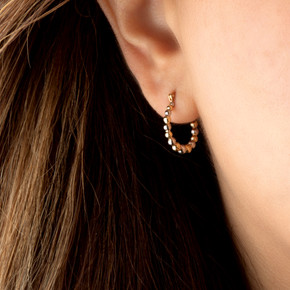 14K Reversible Two Tone Bead Hoop Earrings on female model