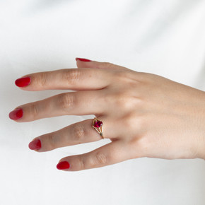 Gold Pear Cut Beaded Cubic Zirconia Birthstone Ring on female model