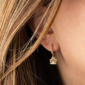 Yellow Gold Lotus Bloom Flower Cuban Link Huggie Earrings on female model