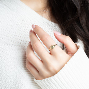 Gold Seashell Ribbed Dome Ring on female model