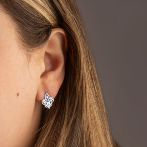 .925 Sterling Silver Blue Enamel French Fleur-de-lis Stud Earrings on female model .925 Sterling Silver Blue Enamel French Fleur-de-lis Stud Earrings on female model