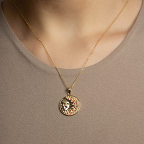 Yellow Gold Sun Face Multi Color Birthstone Star Medallion Pendant Necklace on female model