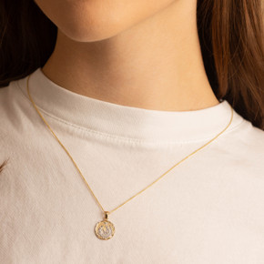 Two-Tone Yellow/White Gold Virgin Mary Baby Jesus Diamond Cut Medallion Pendant Necklace on female model