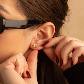 14K Tri-Color Gold High Polish Hawaiian Plumeria Flower Satin Finish Stud Earrings on female model