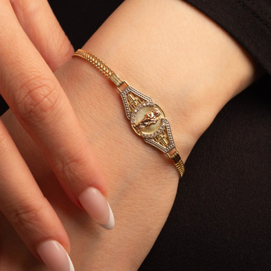 14K Tri-Color Gold 6.5" San Judas Cuban Link Bracelet with Cubic Zirconia on female model