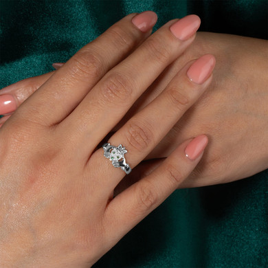 .925 Sterling Silver Woman's Elegant Emerald Claddagh Ring on female model