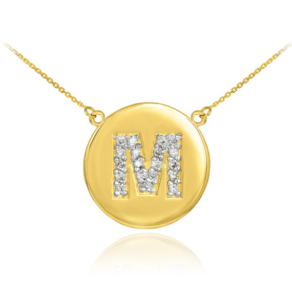 14k Yellow Gold "M" Initial Diamond Disc Double-Mount Necklace.

19 diamonds total approximate weight: 0.25 ct

Diamond clarity: SI1-2

Diamond color: G-H

14k Pendant weight: 1.5 grams

14k Double-mount necklace weight (including weight of pendant and depending on chain length) is approximately 2.5 grams.