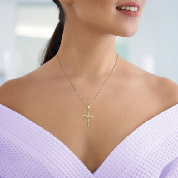 Yellow Gold Triple Nail Cross Pendant Necklace On Model