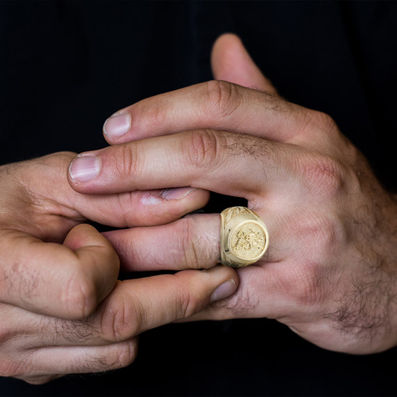 Yellow Gold Beaded Patron Saint George Dragon Cross Signet Ring on a male Model