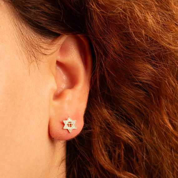Yellow Gold Jewish Chai Star Of David Stud Earrings on female model