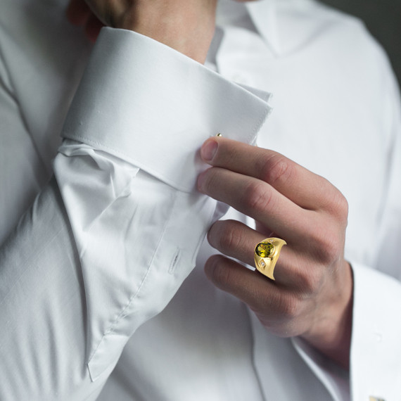Yellow Gold Oval Peridot Gemstone CZ Men's Ring on male model