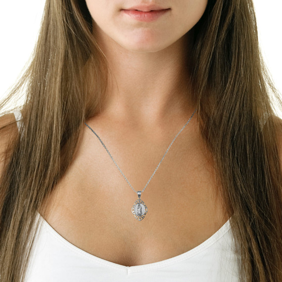 .925 Sterling Silver Our Lady of Guadalupe Greek Key Oval Textured Pendant Necklace on female model