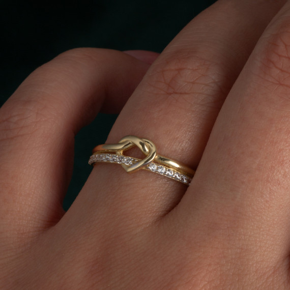 14K Yellow Gold Heart Knot CZ Double Band Ring on female model