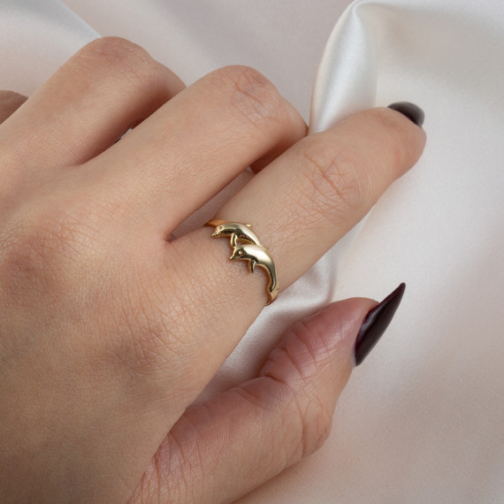 Gold Dolphins Ocean Ring on female model