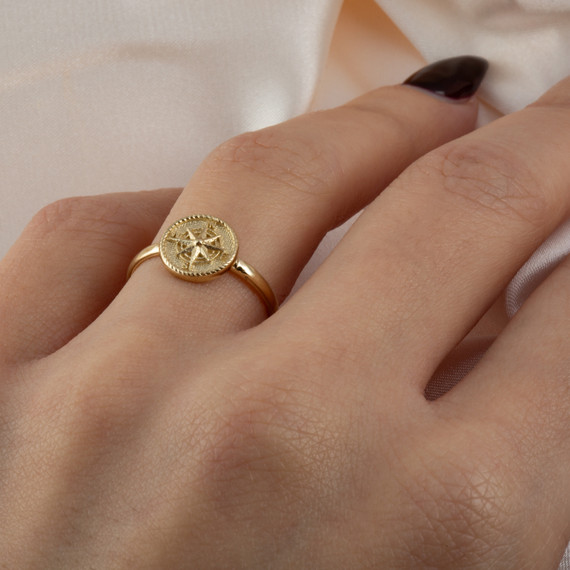 Yellow Gold Nautical Compass Rose Rope Signet Ring on female model