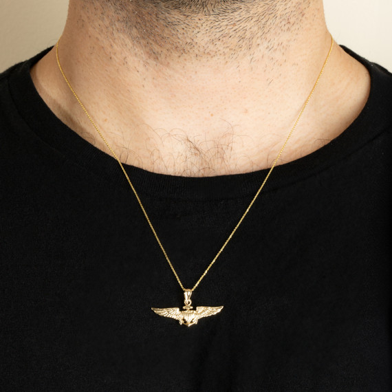 Gold United States Navy Officially Licensed Shield Eagle Anchor Emblem Pendant Necklace on male model