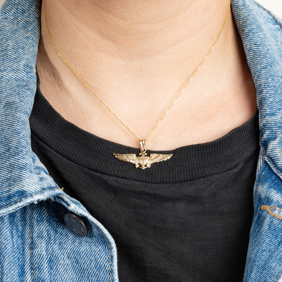 Gold United States Navy Officially Licensed Shield Eagle Anchor Emblem Pendant Necklace on female model