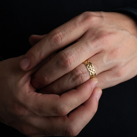 Gold Unisex Eternity Wedding Band Ring on male model