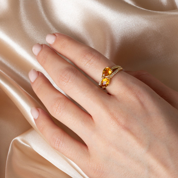 Gold 5 Cut Gemstone Wrap Around Roped Band Ring on female model