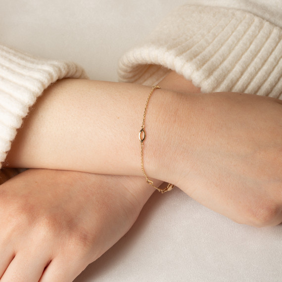 Yellow Gold Oval Link Eternity Bracelet on female model