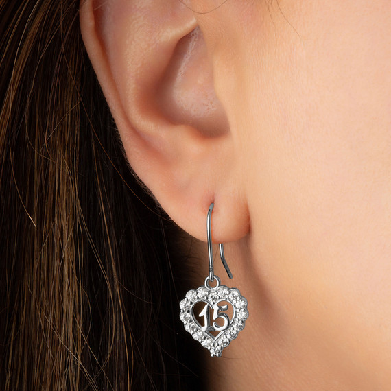 White Gold 15 Años Quinceañera Cubic Zirconia Heart Leverback Earrings on female model