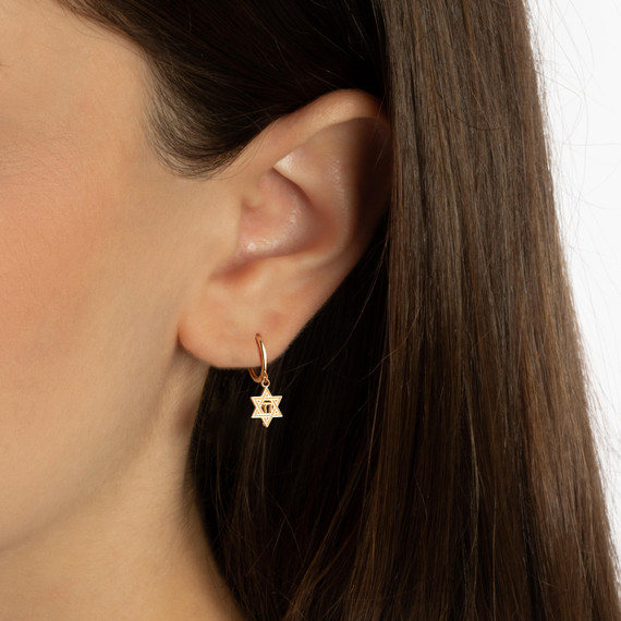Yellow Gold Jewish Chai Star Of David Drop Huggie Hoop Earrings on female model
