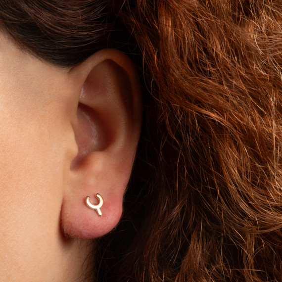 Yellow Gold Lucky Wishbone Stud Earrings on female model