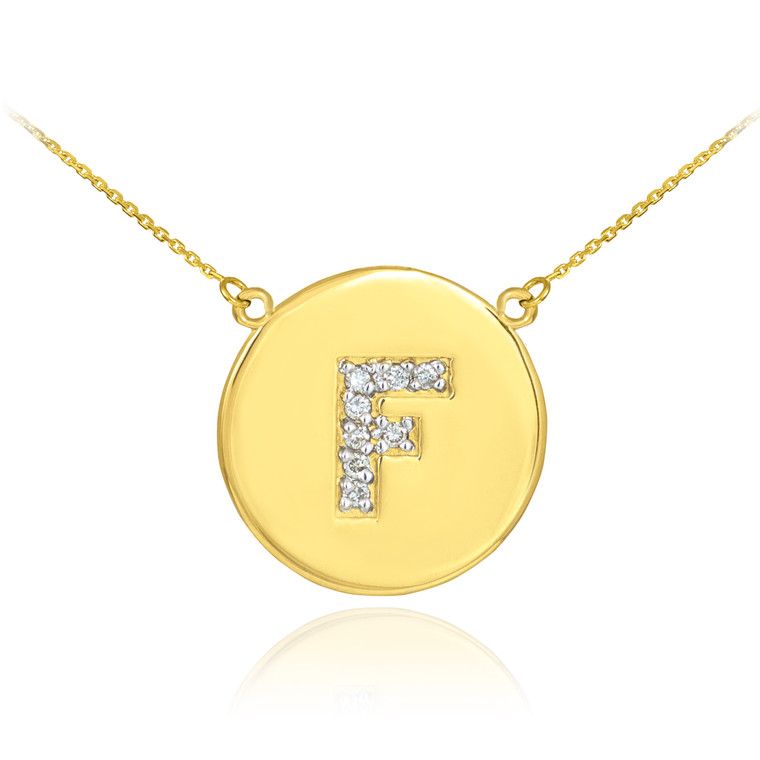 Letter "F" disc necklace with diamonds in 14k yellow gold.