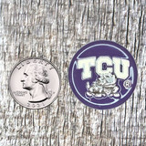 TCU Purple Finish Concho - front view with US Quarter for size comparison.