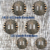 Antiqued Copper Slotted Concho Saddle Set-1 - Front view (4) 1-1/2 inch Conchos and (2) 1 inch Conchos