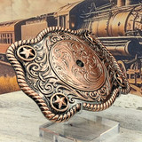 Western Style, Star Trophy Belt Buckle Antique Copper Blank - side view with western background. Western Style, Star Trophy Belt Buckle Antique Copper Blank - side view with western background.