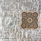 Blooming Floral 1-1/4 Inch Antique Copper Plated Concho - front view with US Quarter for size comparison.