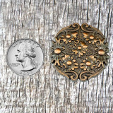 Floral Top 1-1/2 Inch Antique Copper Plated Concho - front view with US Quarter to for size comparison.