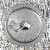 Floral Top 1-1/2 Inch Antique Copper Plated Concho - rear view with Concho screw inserted.