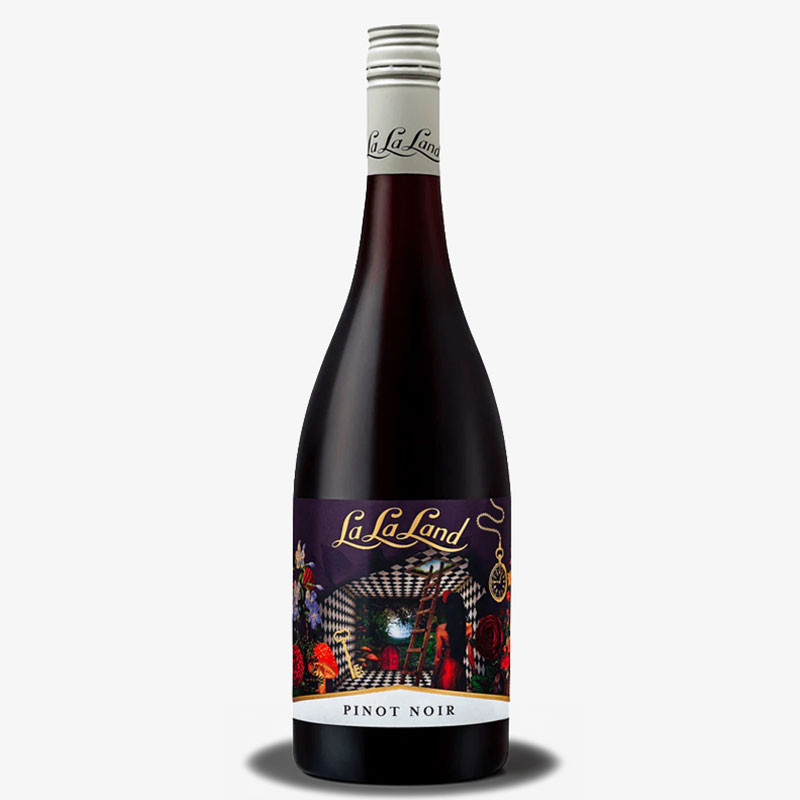 Bottle of La La Land Pinot Noir with silver screw cap and illustrated purple label featuring a whimsical garden scene