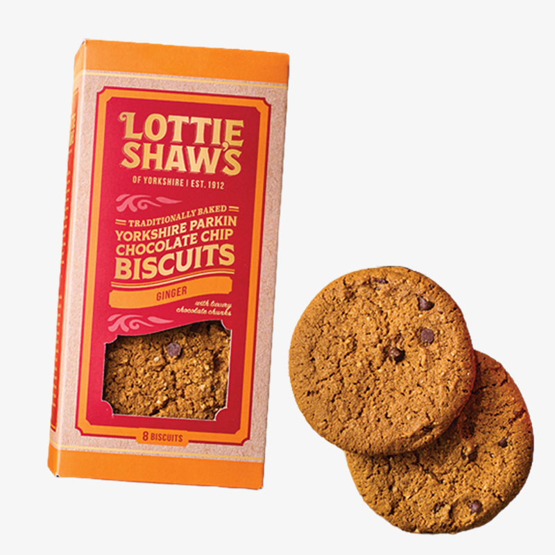 Pack of Lottie Shaw's Yorkshire Parkin Chocolate Chip Ginger Biscuits with two chocolate chip biscuits displayed beside it.