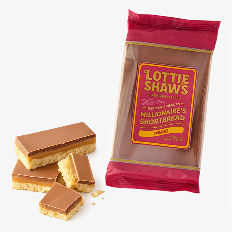 Packet of Lottie Shaw's Millionaire's Shortbread Caramel with layered shortbread, caramel, and milk chocolate pieces displayed alongside.