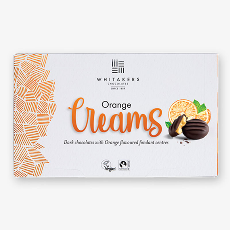 Whitakers Orange Creams dark chocolates with orange fondant centres in a white box.