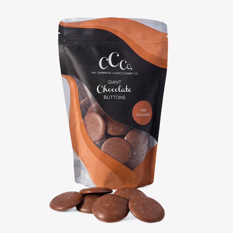 Cambridge Confectionery Co. Giant Milk Chocolate Buttons in a black and orange resealable pouch.